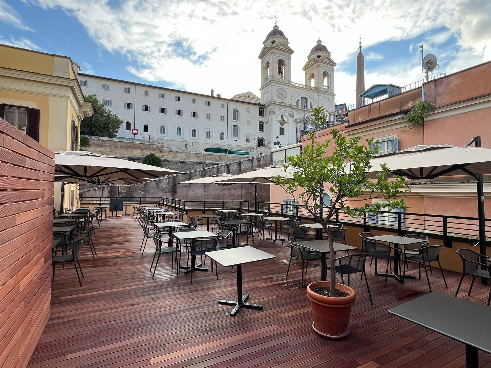 One of Temple Rome's panoramic terraces with a view of Piazza Trinità dei Monti. 