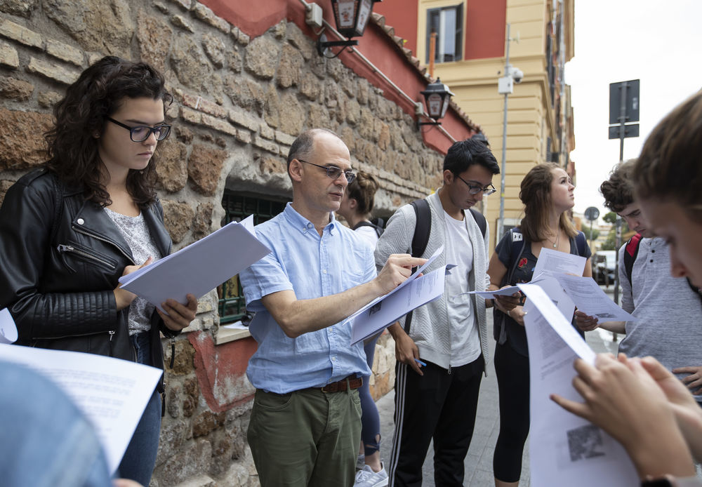 Group of students taking notes in Rome